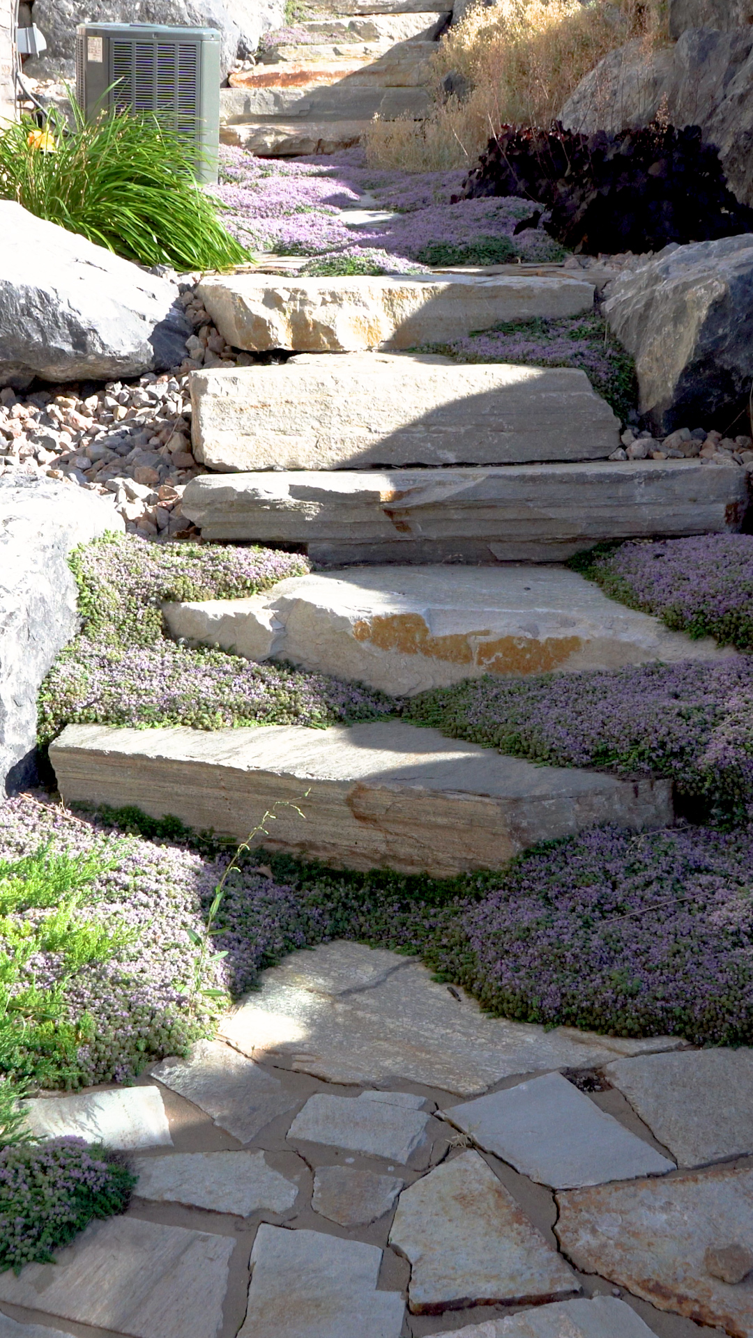 Retaining wall and paver hardscape under construction
