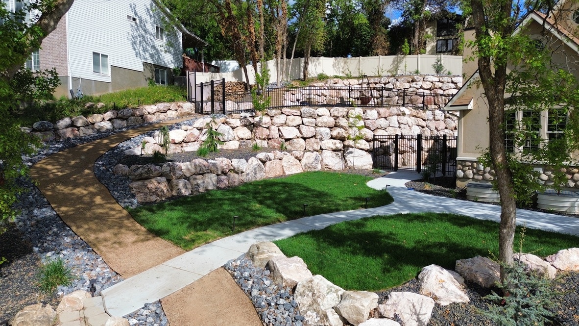 Landscaped common area with retaining wall in a residential community